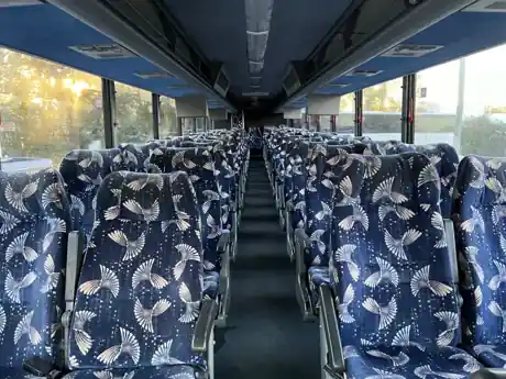 Interior of a Benchmark Coachlines motorcoach with reclining seats