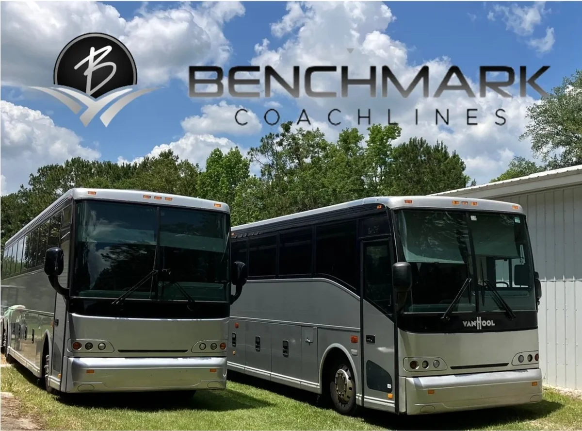 Two Benchmark Coachlines luxury motorcoaches staged and ready in North Florida